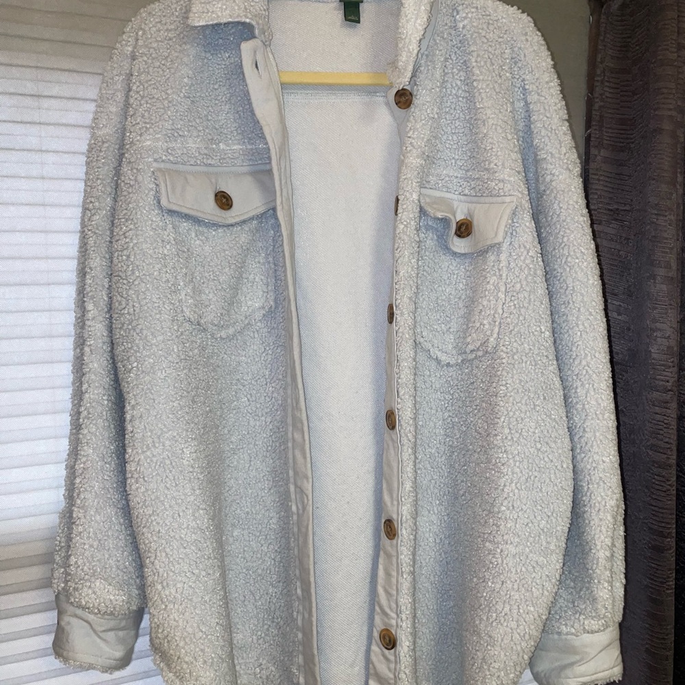 Blue jacket.